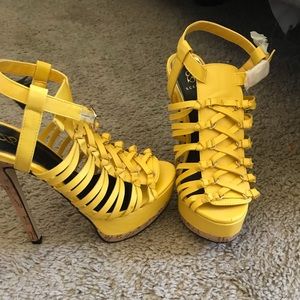 Yellow high heels.